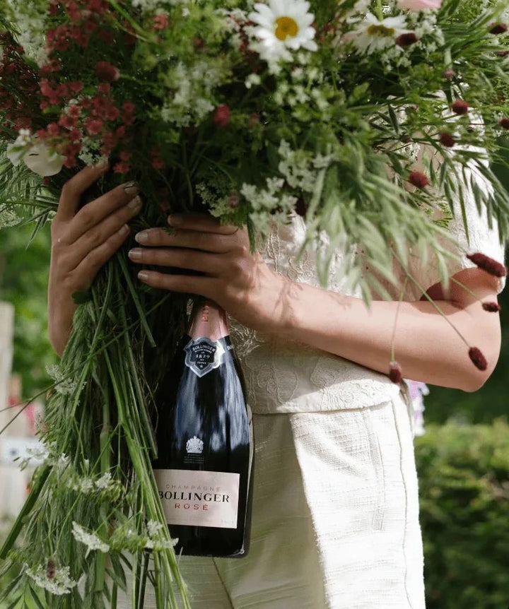 bollinger rose with flower arrangement