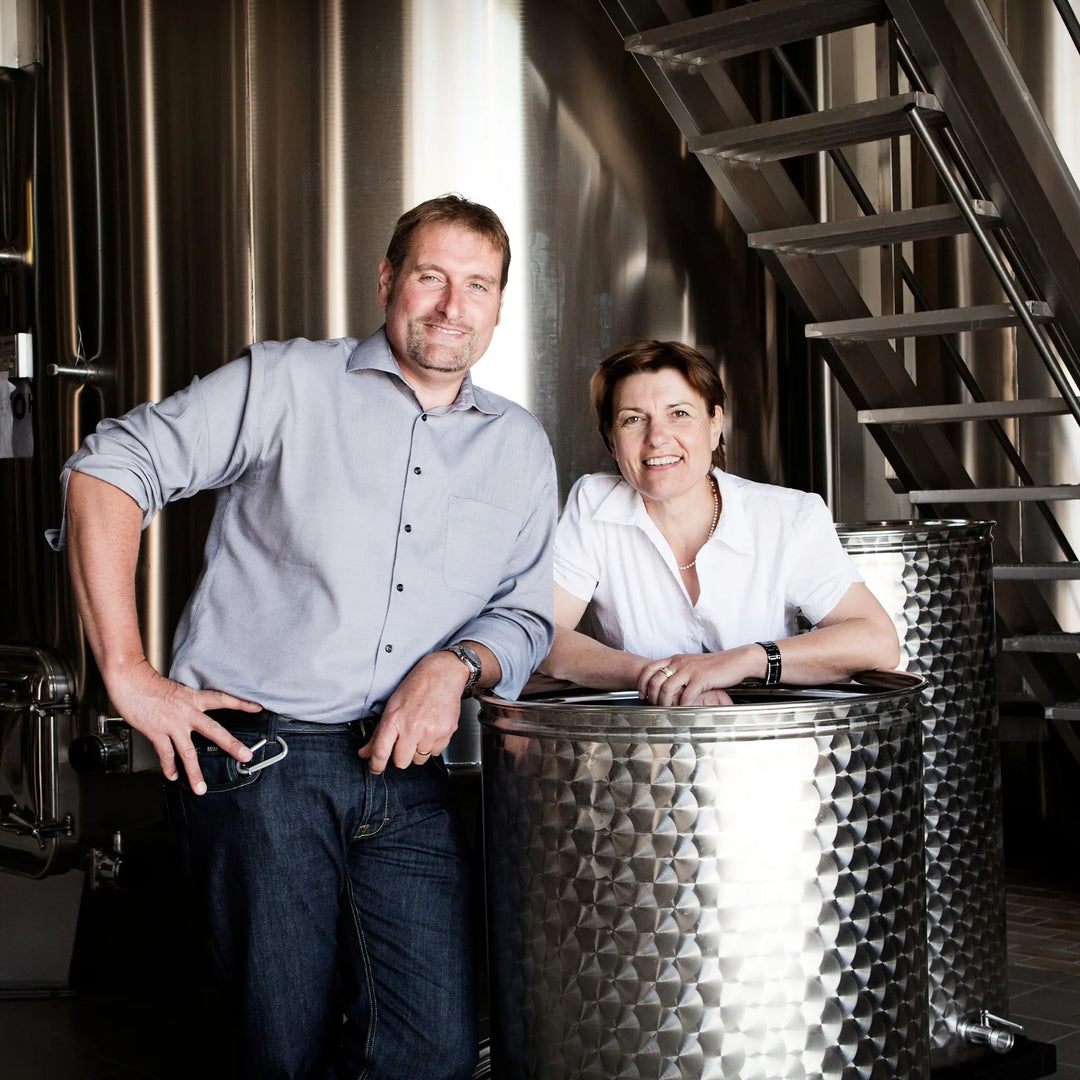 a photo of the Cailleteau Bergeron family in the production facility at the winery