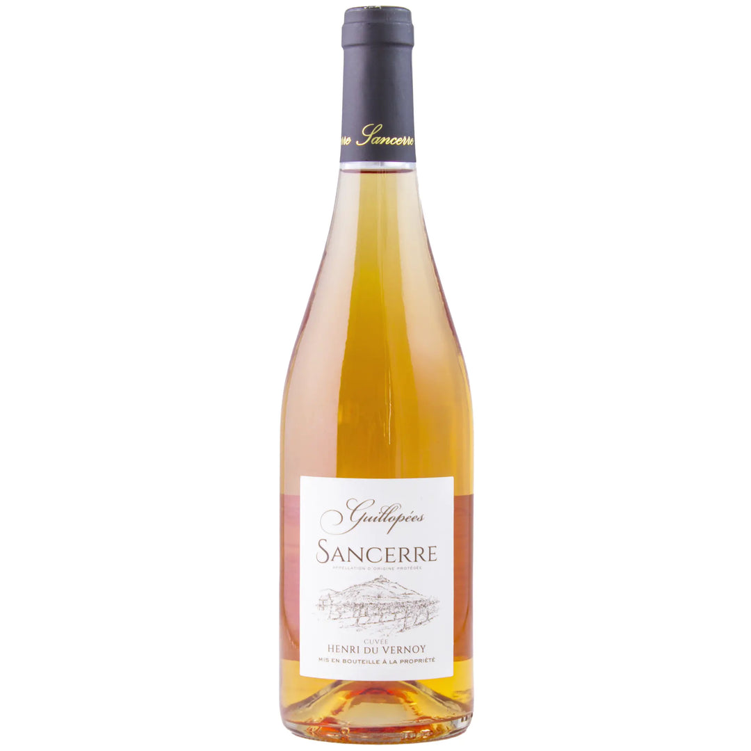 A bottle of Guillopees Sancerre Rosé with a light pink hue, showcasing its label with elegant typography.