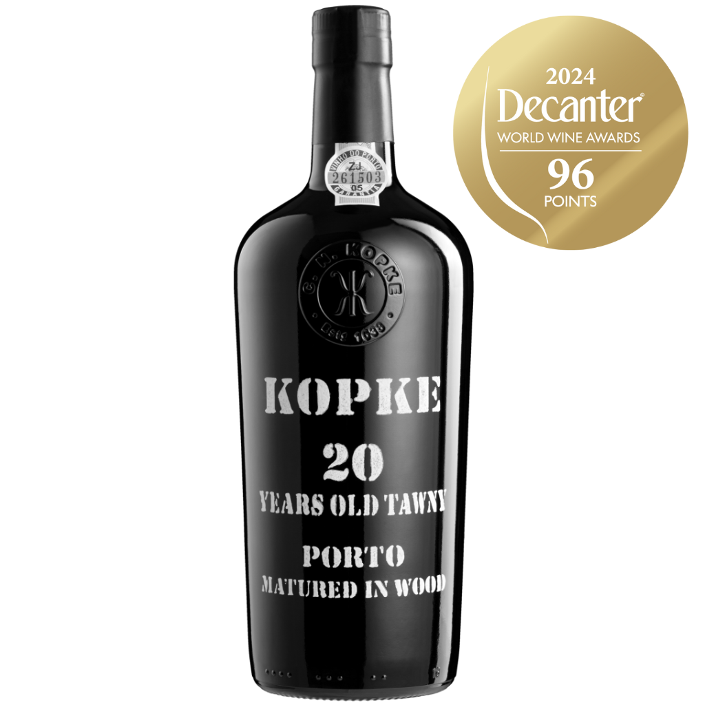 A bottle of Kopke 20-Year-Old Tawny Port with a 2024 Decanter World Wine Awards gold badge, highlighting its prestigious 96-point rating.