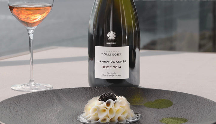 Bollinger La Grande Année Rosé 2014 served with a gourmet dish.