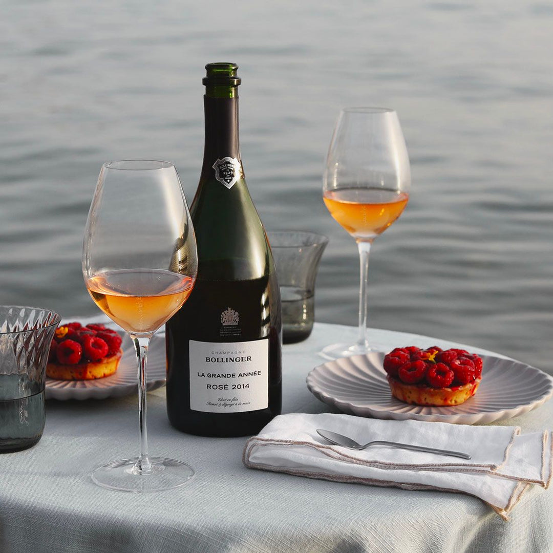 Bollinger La Grande Année Rosé 2014 enjoyed by the sea with dessert.