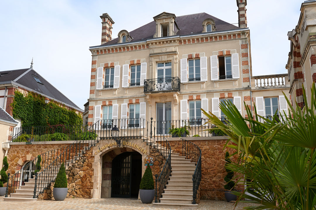 Champagne Bollinger’s grand historical building, showcasing its architectural beauty and legacy.