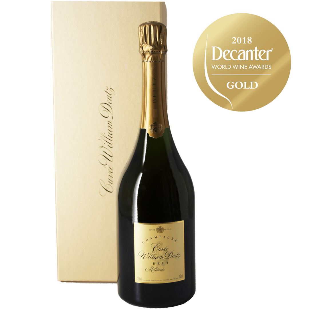 Champagne William Deutz Cuvée Brut Millésime bottle with gold label, luxury box, and Decanter World Wine Awards 2018 Gold Medal.