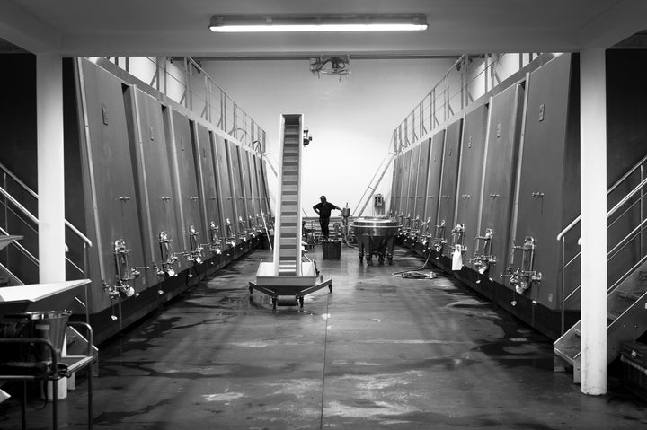 Château Grand Corbin fermentation room with stainless steel tanks.