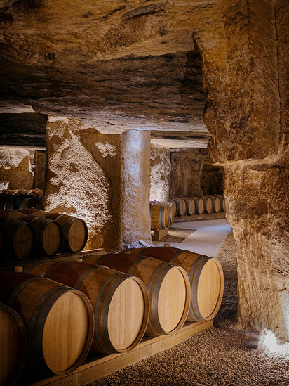 barrels in the cellar of chateau berliquet