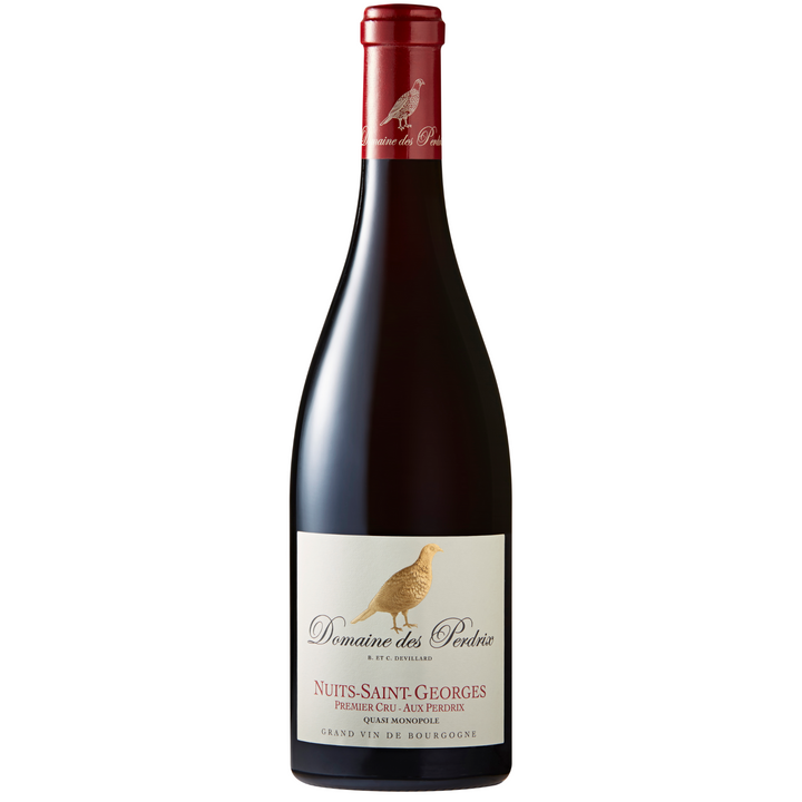 Bottle of Domaine des Perdrix Nuits-Saint-Georges Premier Cru Aux Perdrix wine with a red capsule and elegant label featuring a partridge.