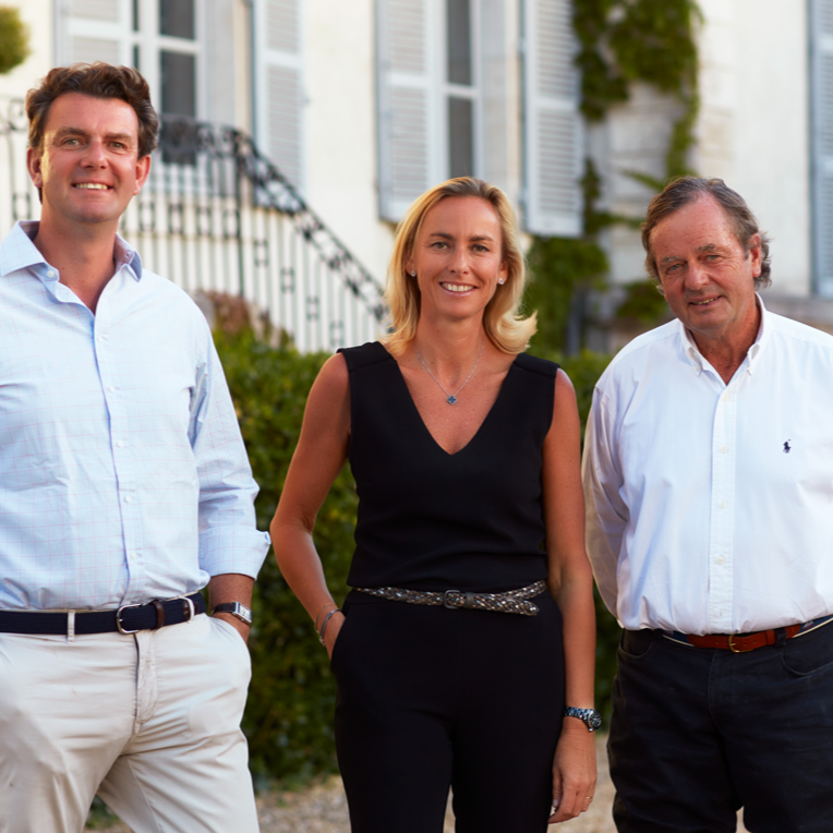 a photo of the domaine devillard family with the son and daughter on the left and the father on the right