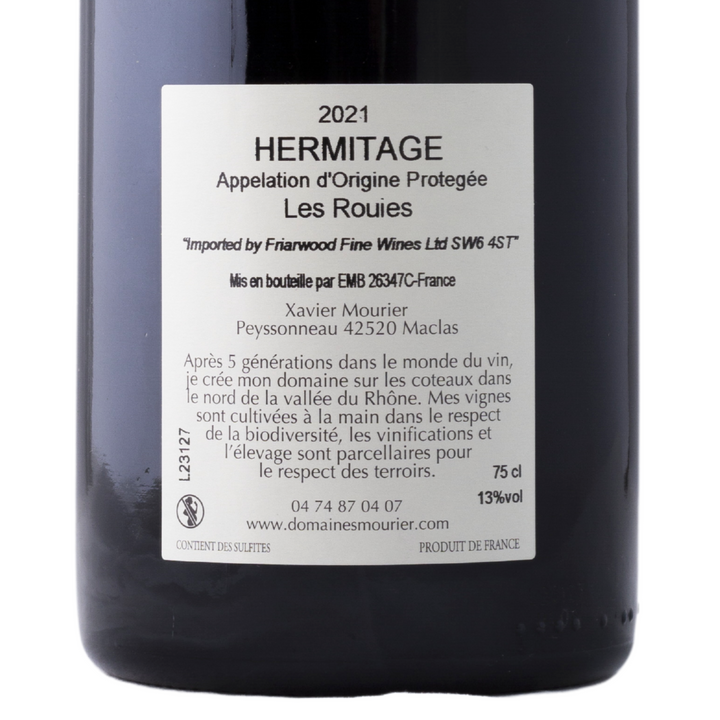 Bottle of Hermitage Les Rouies 2021 by Domaine La Croix de Garde with a close-up of the back label, showcasing details about the wine's origin and production.