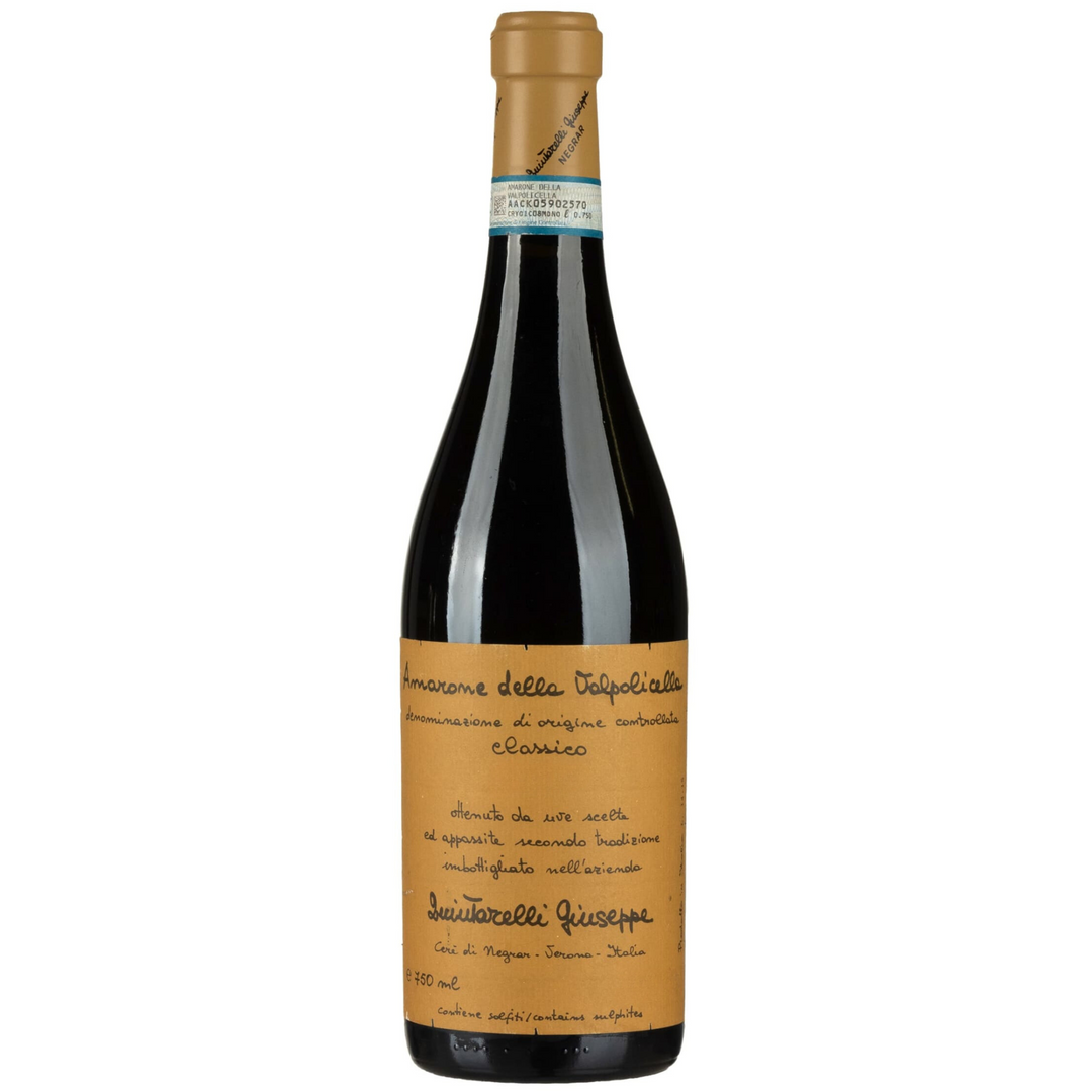 A bottle of Quintarelli Amarone della Valpolicella Classico, featuring its signature handwritten-style label and traditional Italian design.