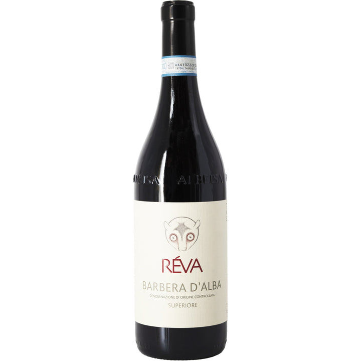 Bottle of Réva Barbera d'Alba Superiore red wine from Italy.