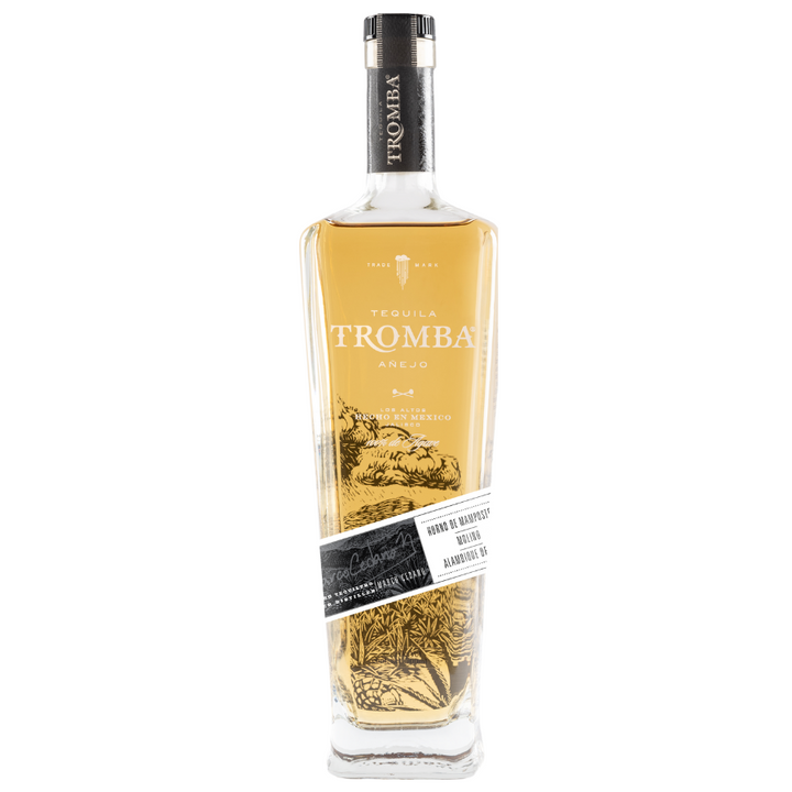 Tromba Añejo Tequila bottle displayed elegantly with a golden hue, highlighting its premium quality.