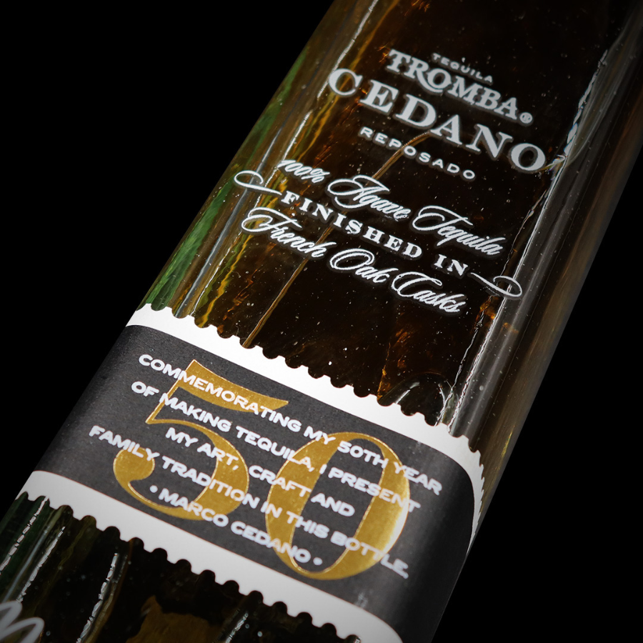 Close-up of the Tromba Cedano Reposado Tequila label, highlighting its French Oak Cask finish and 50th-anniversary commemorative design.