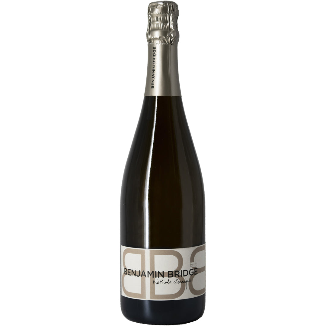 Bottle of Benjamin Bridge Brut sparkling wine, featuring a sleek design with a minimalist label and silver foil, crafted in Canada.