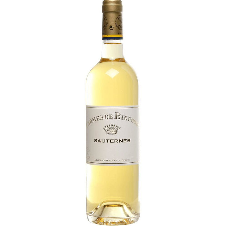 Bottle of Carmes de Rieussec Sauternes sweet white wine from Bordeaux, France.