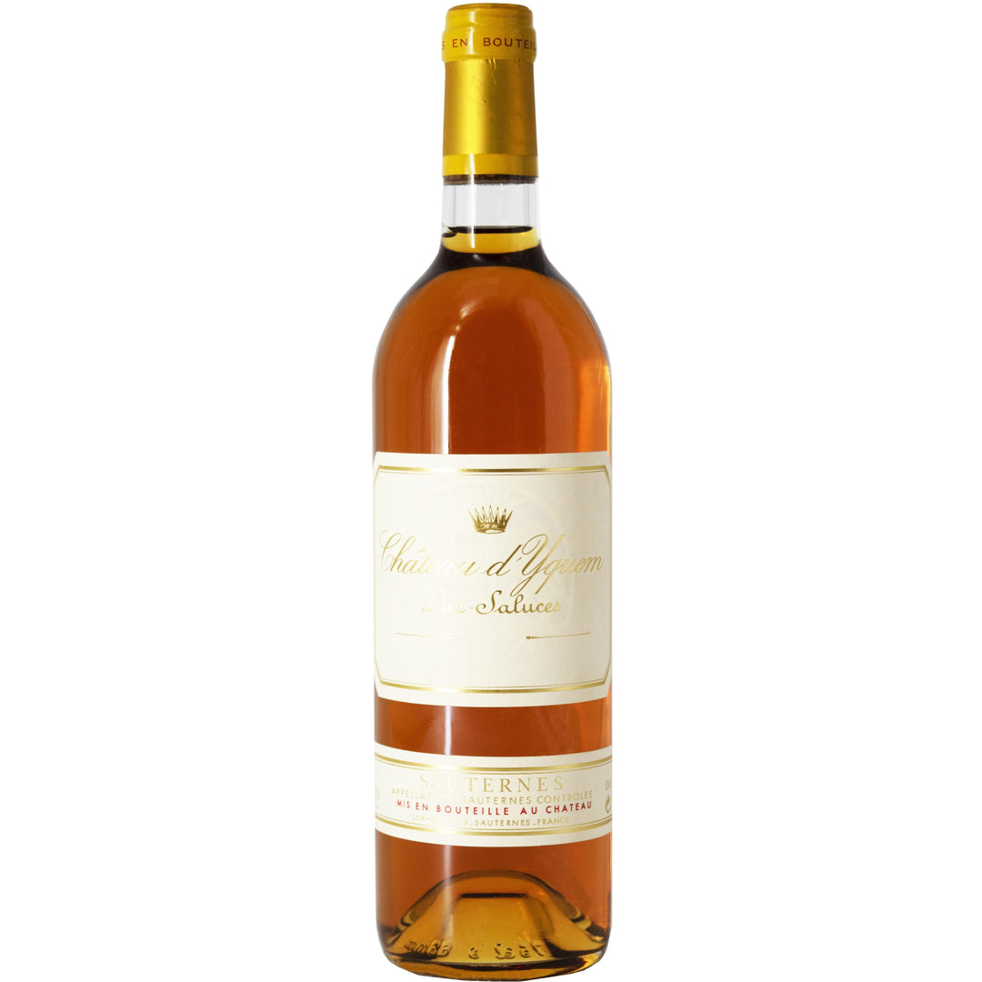 Bottle of Château d'Yquem Sauternes wine with golden-hued liquid.