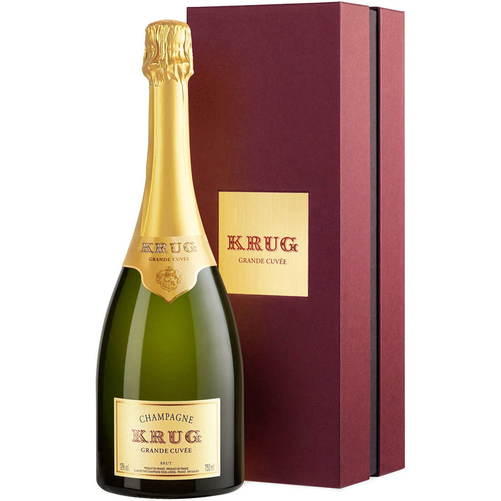 A bottle of Krug Grande Cuvée Champagne displayed elegantly with its luxurious gift box.