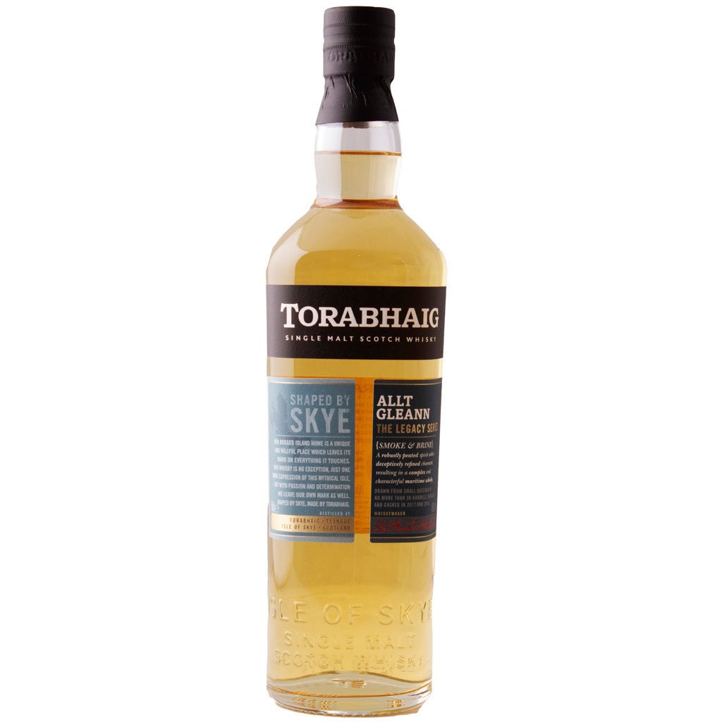 A bottle of Torabhaig Allt Gleann Single Malt Whisky, highlighting the unique design and its light golden hue.